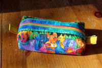 https://cherishedneedlecreations.wordpress.com/2013/11/04/serger-zippered-pouch-tutorial/